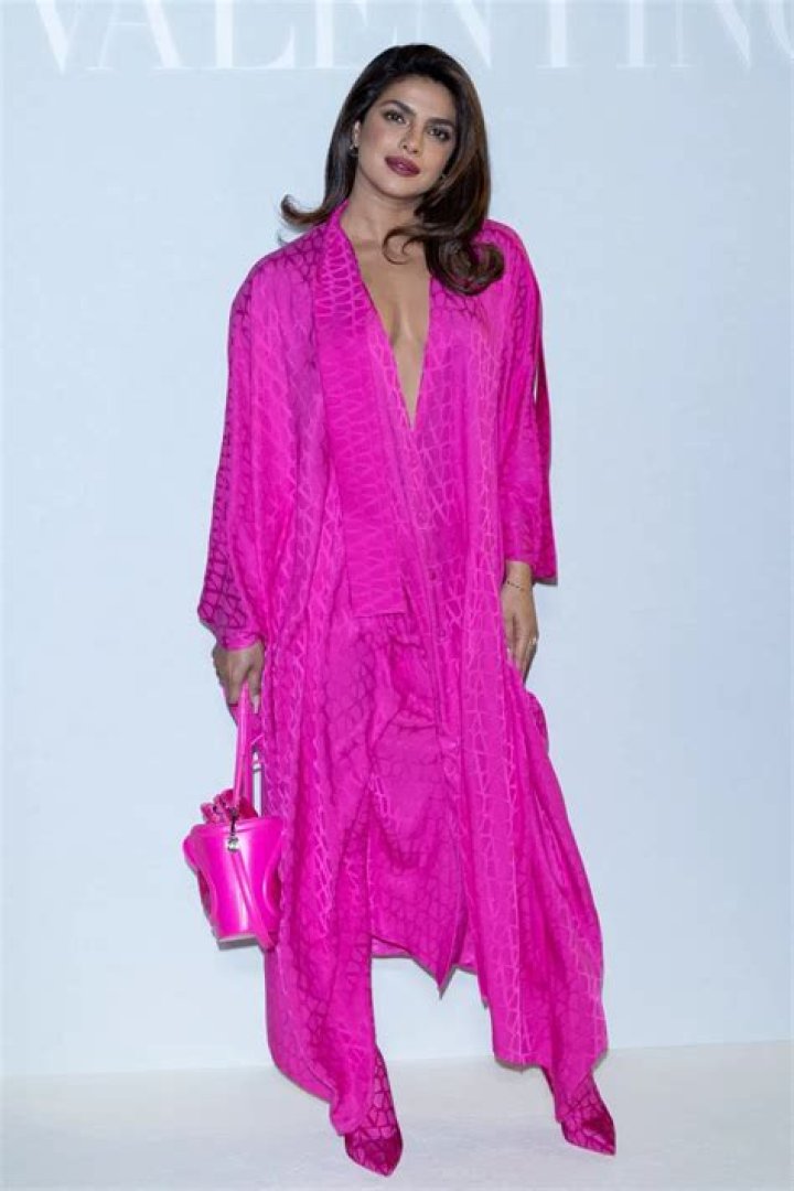 Priyanka Chopra Stuns In Plunging Pink Outfit As She Matches Nick Jonas At Paris Fashion Week